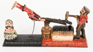 Antique bell toys, rare banks and Victorian Christmas cards were the big winners at Milestone’s Dec. 6 auction